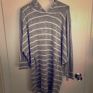 Long striped crew style shirt with hood and pocket